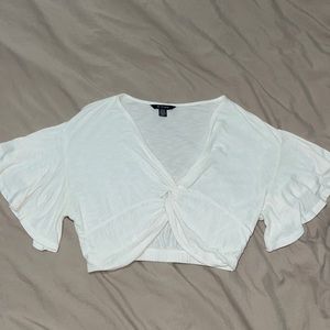 White tied front crop top with flare sleeves